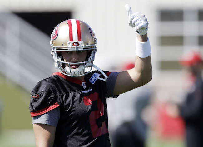 For the deep league crowd, Liz Loza gives Brian Hoyer a thumbs up. (AP)