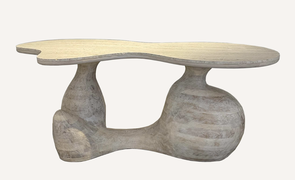 Travertine console table featured in Aaron Poritz' 
