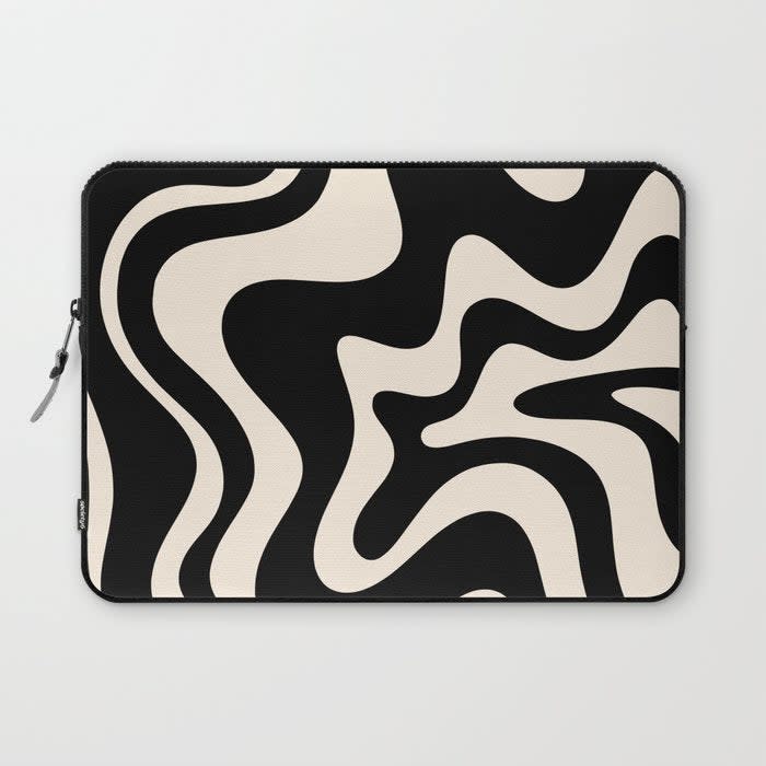 <br><br><strong>Kierkegaard Design Studio</strong> Retro Liquid Swirl Abstract in Black and Almond Cream Laptop Sleeve, $, available at <a href="https://go.skimresources.com/?id=30283X879131&url=https%3A%2F%2Fsociety6.com%2Fproduct%2Fretro-liquid-swirl-abstract-in-black-and-almond-cream5628372_laptop-sleeve%3Fsku%3Ds6-21260579p45a58v428" rel="nofollow noopener" target="_blank" data-ylk="slk:Society6" class="link ">Society6</a>