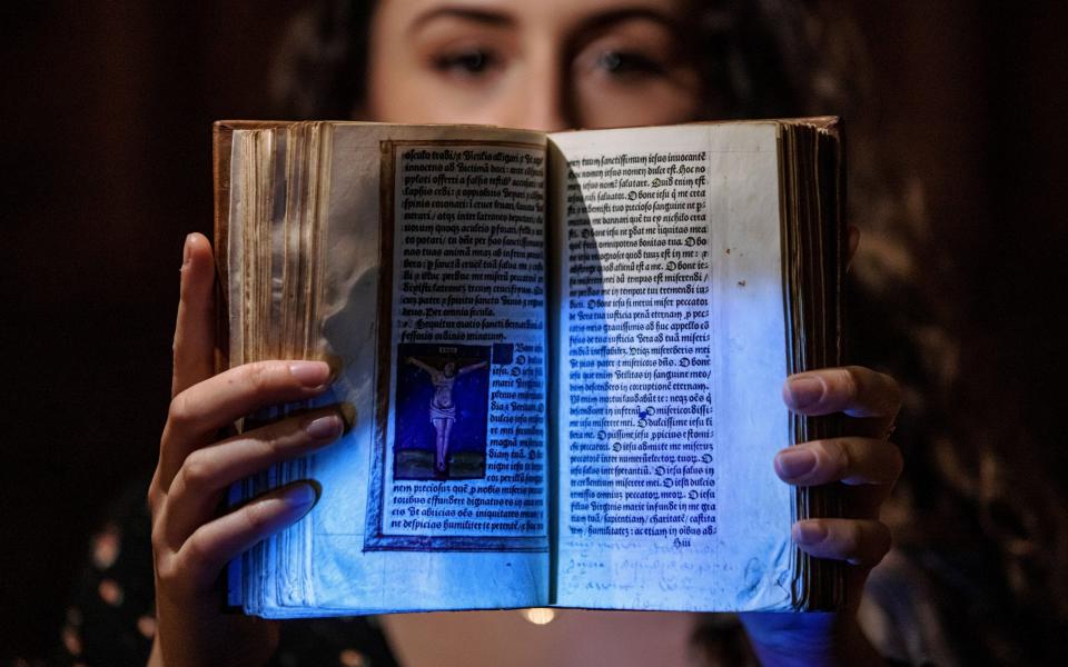 Ultraviolet light revealed erased messages in the book 