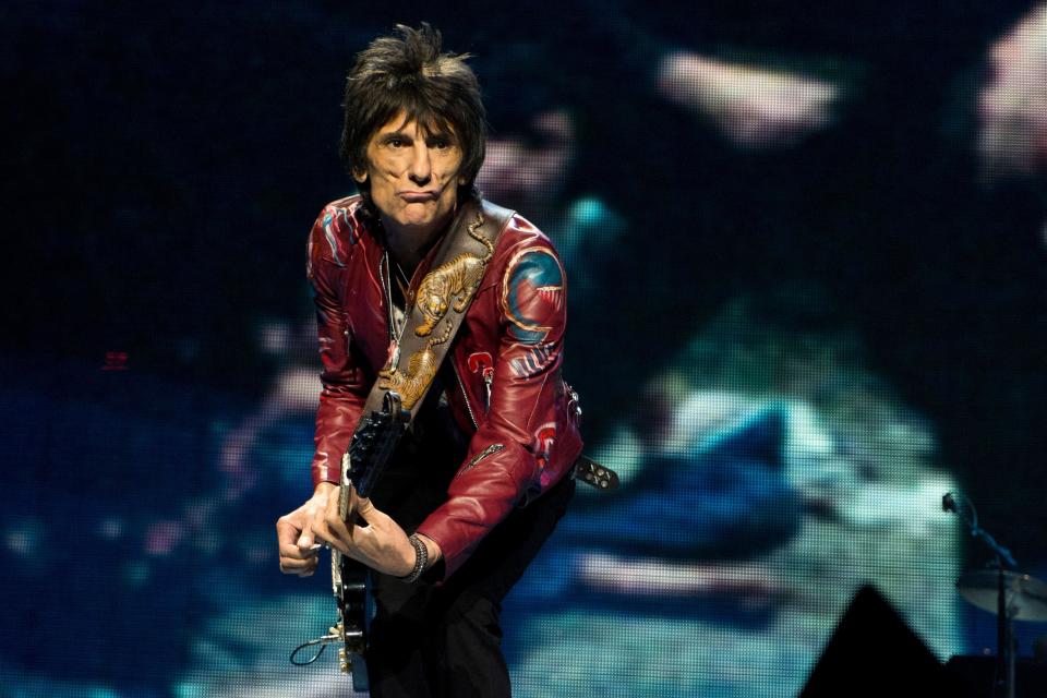 Ronnie Wood of The Rolling Stones performs at TD Garden on June 14, 2013 in Boston. (Photo by Amy Harris/Invision/AP)