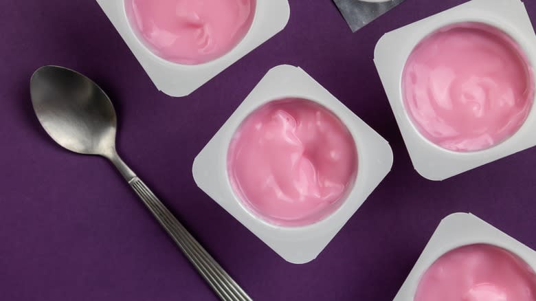 Pots of flavored yogurt