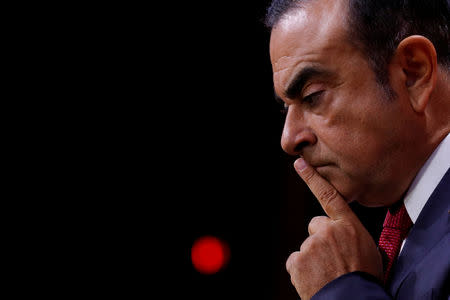 FILE PHOTO: Carlos Ghosn, Chairman and CEO of the Renault-Nissan Alliance, reacts during a news conference in Paris, France, September 15, 2017. REUTERS/Philippe Wojazer/File Photo