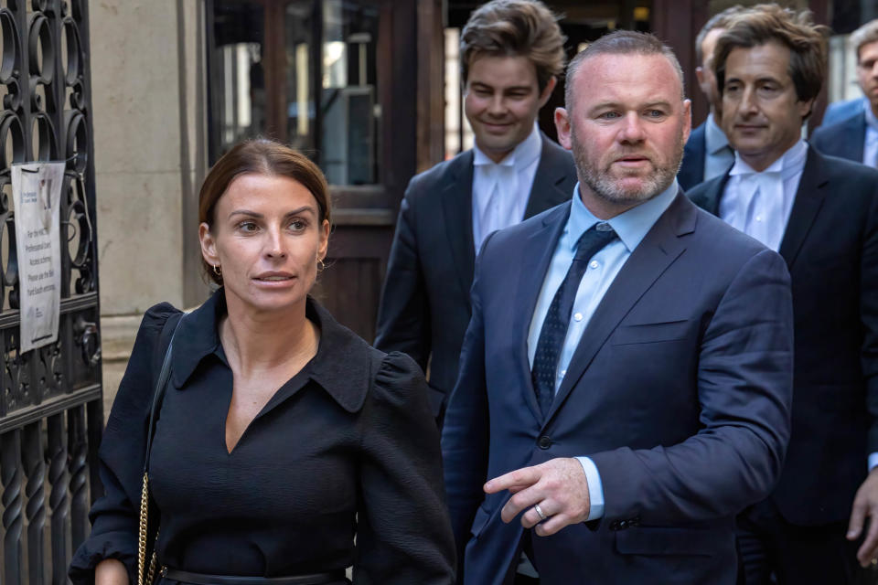 Wayne Rooney supports wife Coleen Rooney at court