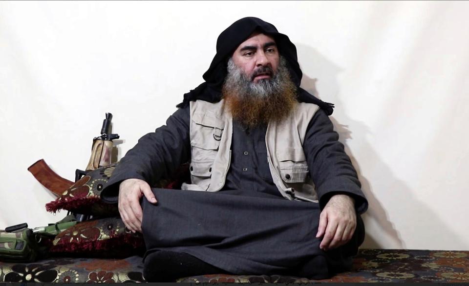 This file image made from video posted on a militant website April 29, 2019, purports to show the leader of the Islamic State group, Abu Bakr al-Baghdadi being interviewed by his group's Al-Furqan media outlet. In his last months on the run, al-Baghdadi was agitated, fearful of traitors, sometimes disguised as a shepherd, sometimes hiding underground, always dependent on a shrinking circle of confidants. (Al-Furqan media via AP, File)