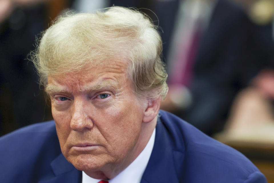 FILE - Former President Donald Trump attends the closing arguments in the Trump Organization civil fraud trial at New York State Supreme Court in the Manhattan borough of New York, Jan. 11, 2024. A New York judge has ruled against Donald Trump Friday, Feb. 16, 2024, imposing a $364 million penalty over what the judge said was a yearslong scheme to dupe banks and others with financial statements that inflated the former president’s wealth. Trump also has been barred from serving as an officer or director of any New York corporation for three years. However, the judge backed away from an earlier ruling that would have dissolved the former president’s companies. (Shannon Stapleton/Pool Photo via AP, File)