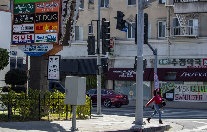LOS ANGELES, CA - MARCH 18: Street scene on Western Ave. in Koreatown on Thursday, March 18, 2021 in Los Angeles, CA. (Brian van der Brug / Los Angeles Times)