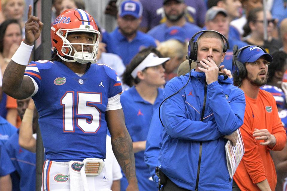 With Anthony Richardson (15) looking awfully shaky the past two games, Florida coach Billy Napier (R) needs his quarterback to bounce back in his first road start Saturday  in a tough environment at Tennessee's Neyland Stadium.