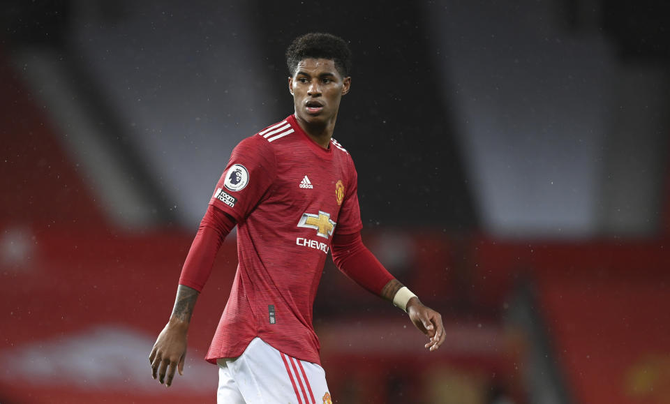 Manchester United's Marcus Rashford looks out during the English Premier League soccer match between Manchester United and Chelsea, at the Old Trafford stadium in Manchester, England, Saturday, Oct. 24, 2020. (Michael Regan/Pool via AP)