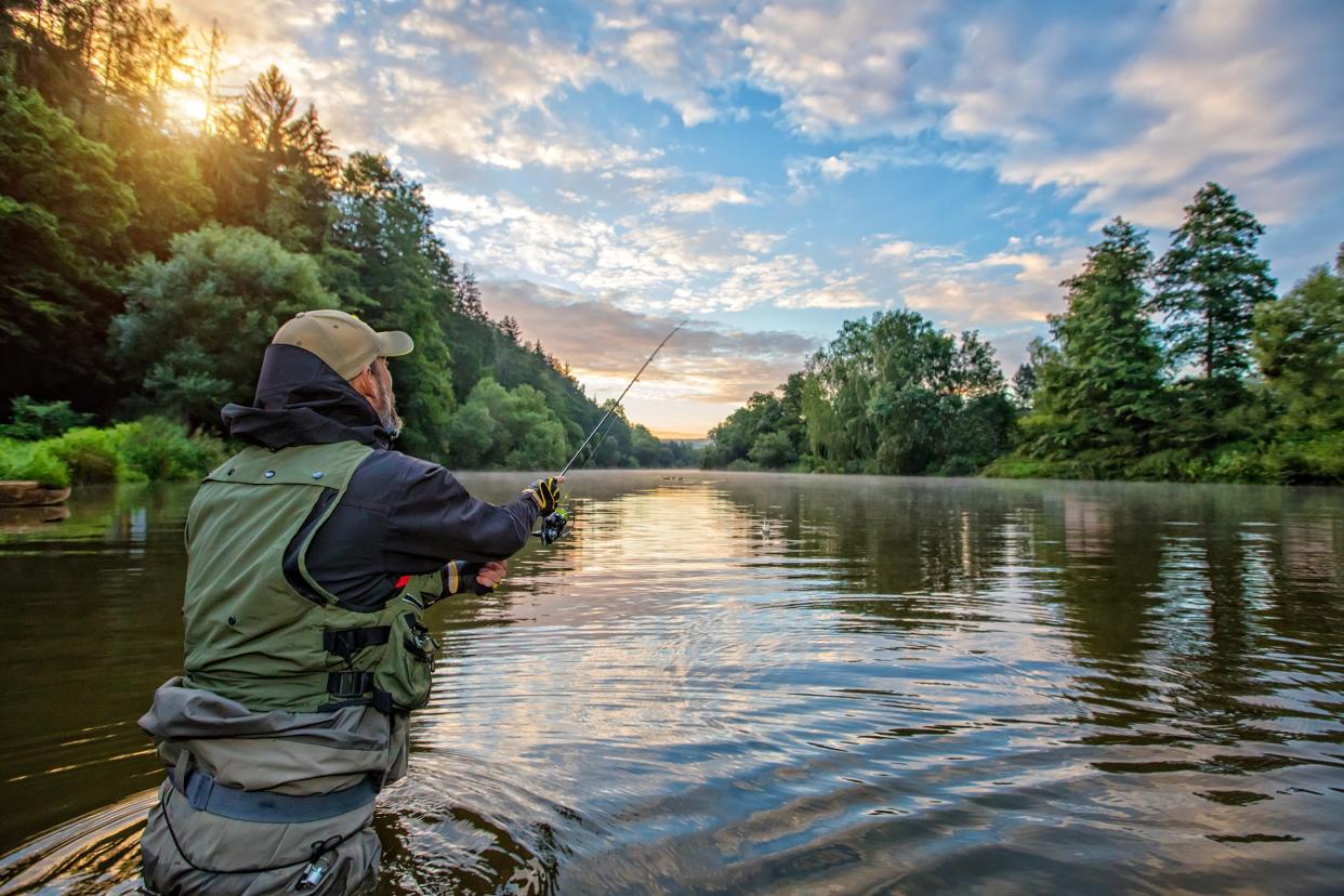 sport fisherman hunting fish