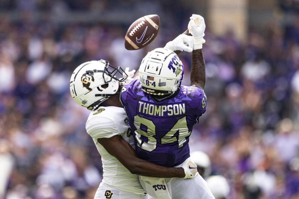 TCU wide receiver Warren Thompson (84) gets a reception broken up by Colorado defensive back Omarion Cooper (3) in the first quarter during a college football game between the TCU Horned Frogs and the Colorado Buffaloes at Amon G. Carter Stadium in Fort Worth on Saturday, Sept. 2, 2023.