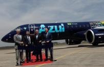 Neeleman, founder of Azul SA, Rodgerson, CEO of Azul SA, Slattery, head of commercial aviation at Brazilian planemaker Embraer and Kelly, CEO and Executive Director of AerCap attend an event in Sao Jose dos Campos