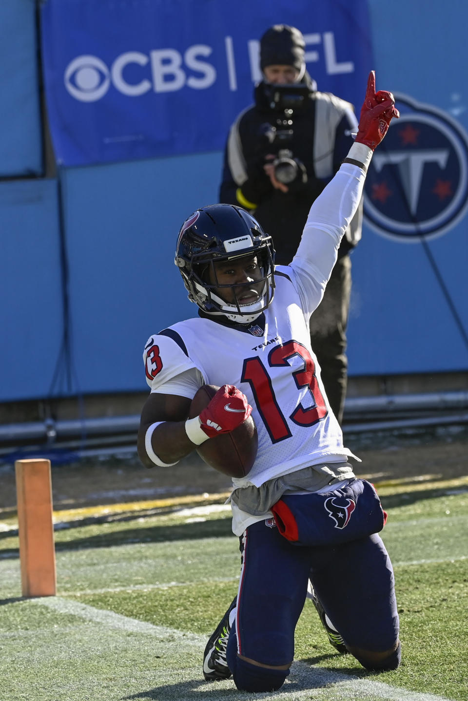 Houston Texans wide receiver Brandin Cooks (13) celebrates his touchdown against the Tennessee Titans during the first half of an NFL football game, Saturday, Dec. 24, 2022, in Nashville, Tenn. (AP Photo/Mark Zaleski)