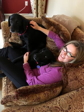 <p>Courtesy of the Wexton Family</p> Jennifer Wexton with her two Labrador retrievers, who were rescued by the family