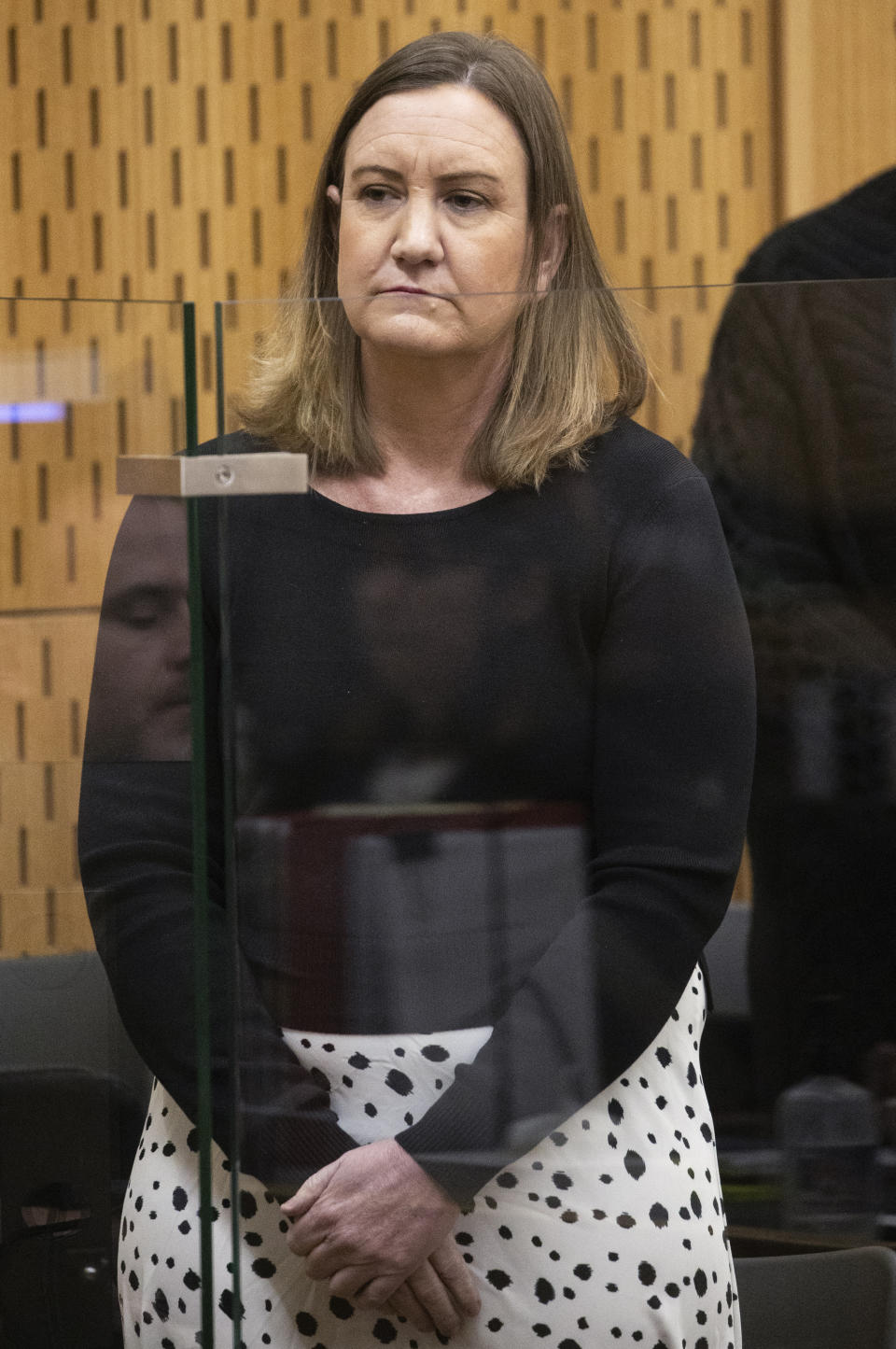Lauren Dickason stands in the dock at the Christchurch High Court, in Christchurch, New Zealand, on July, 17, 2023. A New Zealand jury on Wednesday, Aug. 16, found Dickason, a mother guilty of murdering her three young daughters in a case that shocked the nation. (George Heard/New Zealand Herald via AP)