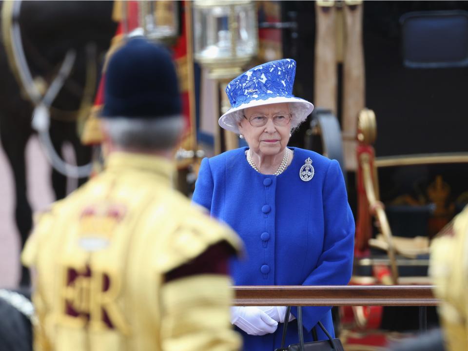 Queen Elizabeth wearing blue at Trooping the Colour in 2013.