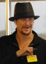 <p>Kid Rock’s bad experience at Waffle House had nothing to do with the food, so he probably won’t be holding any grudges. The “All Summer Long” rocker was arrested at an Atlanta Waffle House in 2007 after he and his entourage — there to celebrate his first No. 1 album — got into a brawl that began over some trash talking. Maybe next time he should celebrate at Denny’s? (Photo: Chris McKay/WireImage) </p>