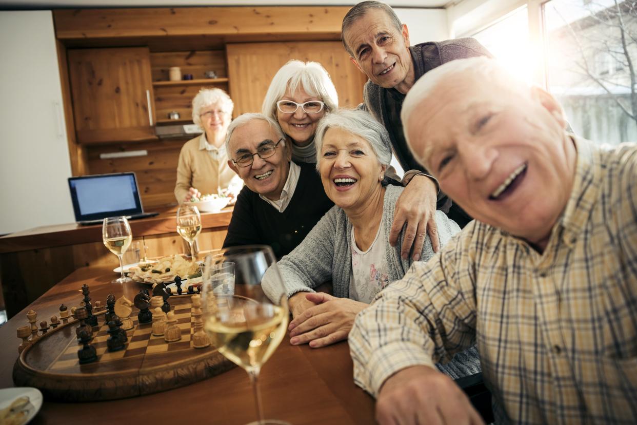 senior adults taking a picture of themselves