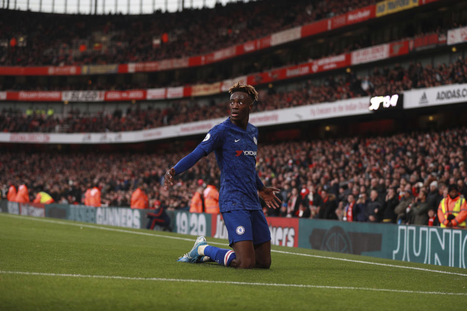 Chelsea's Tammy Abraham celebrates after scoring his side's second goal during the English Premier League soccer match between Arsenal and Chelsea, at the Emirates Stadium in London, Sunday, Dec. 29, 2019. (AP Photo/Ian Walton)