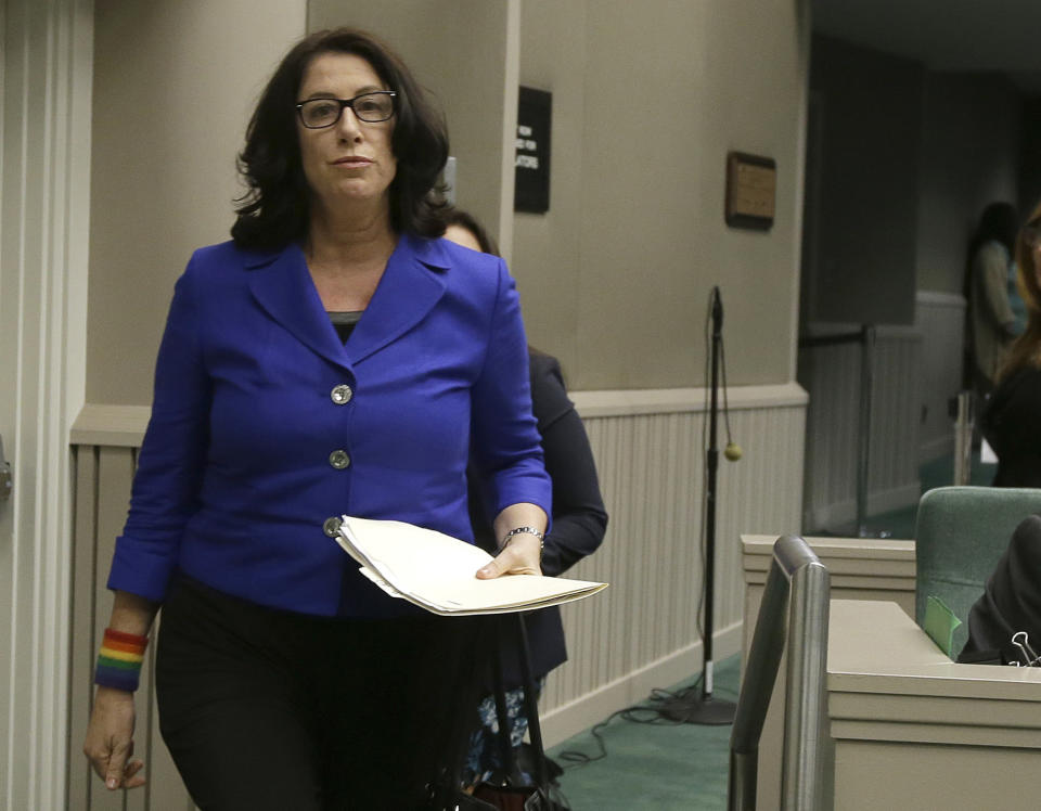 FILE - Christine Pelosi walks to the dais to speak before an Assembly subcommittee in Sacramento, Calif., on Nov. 28, 2017. A San Francisco judge disclosed Friday, Nov. 4, 2022, that she had worked with House Speaker Nancy Pelosi's daughter, Christine Pelosi, in the 1990s, giving prosecutors and the public defender's office the opportunity to object to her role in the case against a man who is accused of breaking into the Pelosi home, beating her husband and seeking to kidnap the speaker. (AP Photo/Rich Pedroncelli, File)
