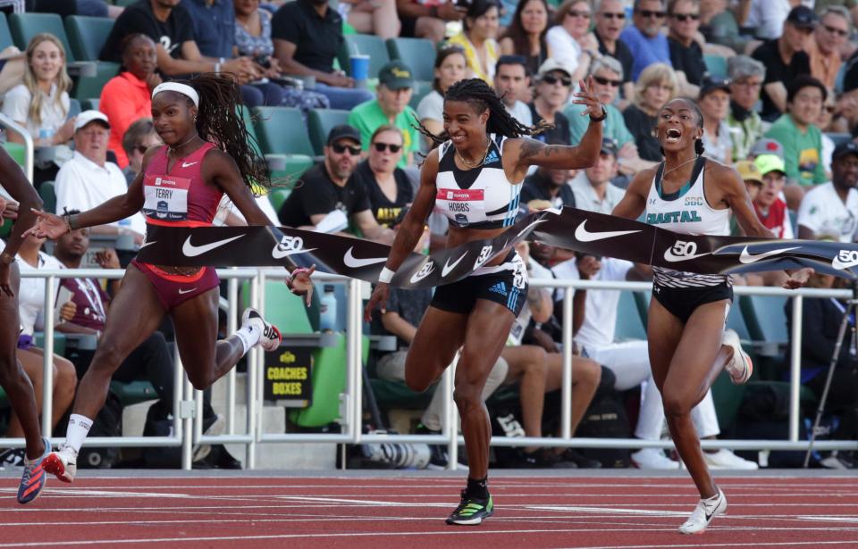 Melissa Jefferson, right, breaks the tape to win the women's 100 ahead of Aleia Hobbs, second and Twanisha Terry, third, right, on day two of the USA Track and Field Championships 2022 at Hayward Field in Eugene Friday June 24, 2022.