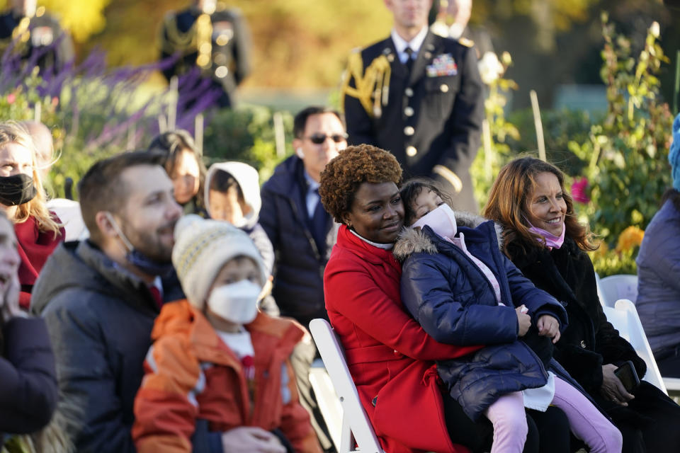 White House deputy press secretary Karine Jean-Pierre and others listen as President Joe Biden speaks during a ceremony to pardon the national Thanksgiving turkey in the Rose Garden of the White House in Washington, Friday, Nov. 19, 2021. (AP Photo/Susan Walsh)