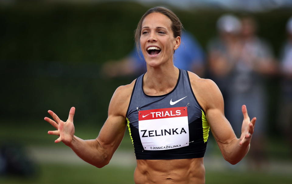Jessica Zelinka, from London, Ont., celebrates her victory in the women's 100-metre hurdles at the Canadian Track and Field Championships in Calgary, Alta., Saturday, June 30, 2012.THE CANADIAN PRESS/Jeff McIntosh