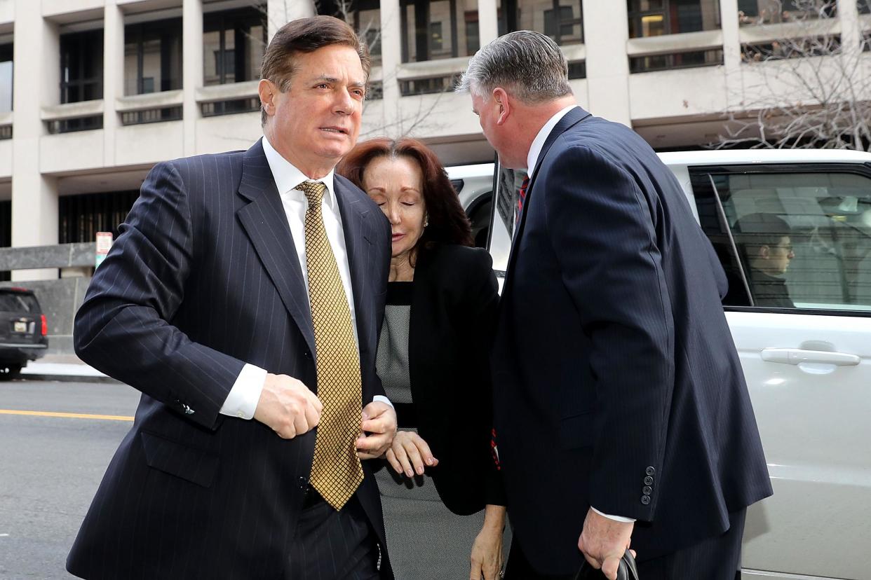 Mr Manafort and his wife arrive at a courthouse in Washington DC in January: Getty Images