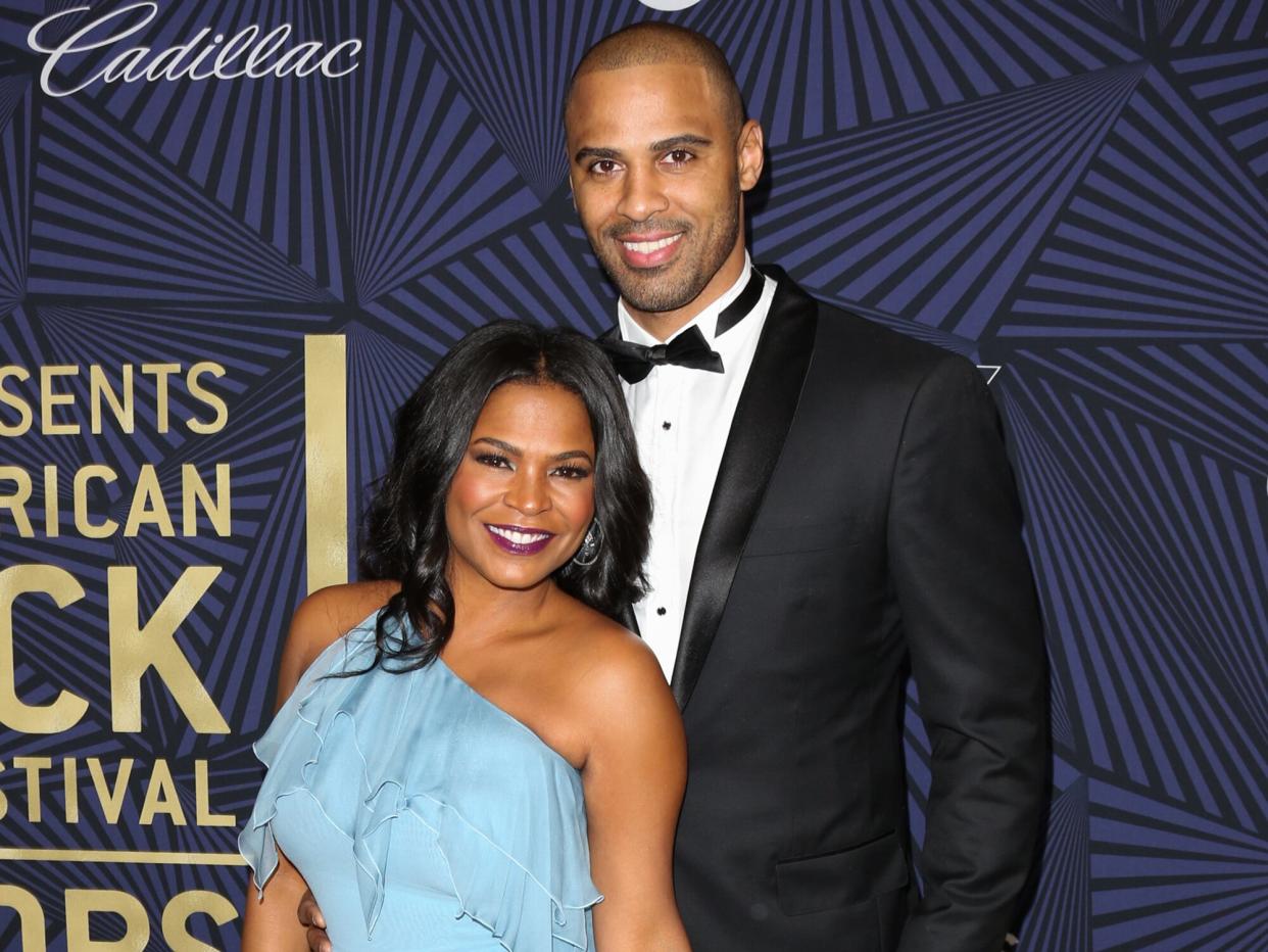 Nia Long (L) and her Husband Ime Udoka (R) attend the BET's 2017 American Black Film Festival Honors Awards at The Beverly Hilton Hotel on February 17, 2017 in Beverly Hills, California