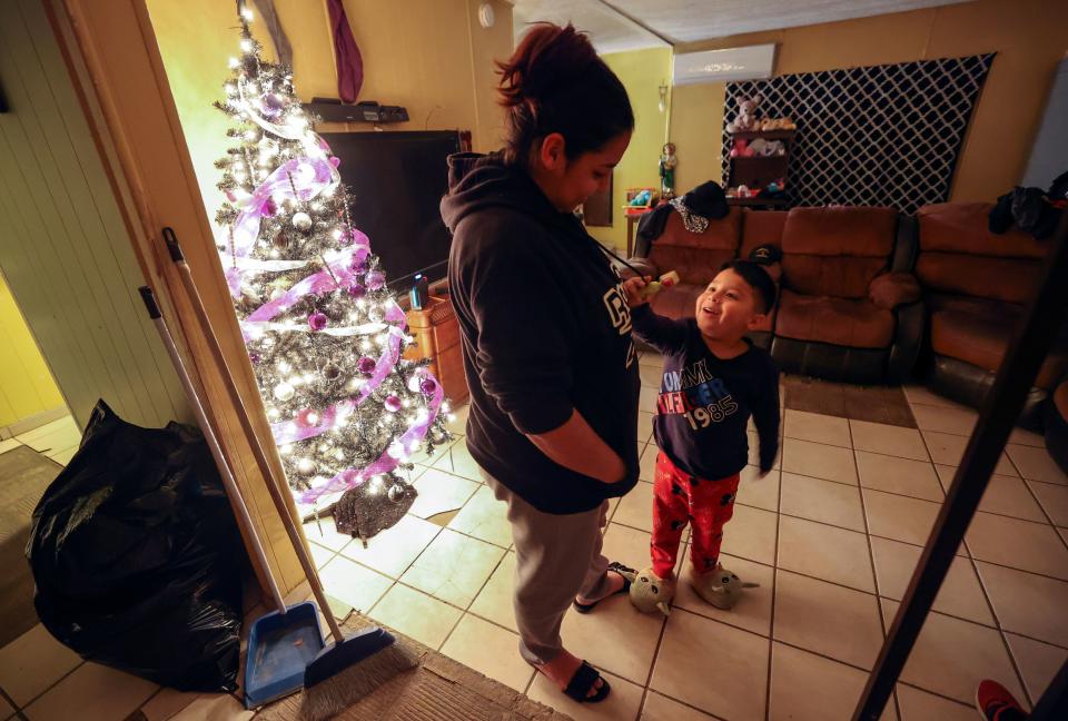 Rosa Mandujano talks with her son Ruben Mandujano, 5, at home near the Salton Sea and Mecca, California, on Thursday, Dec. 14, 2023. Ruben, who is autistic and has asthma, frequently gets sick and has a hard time fighting infections. | Kristin Murphy, Deseret News