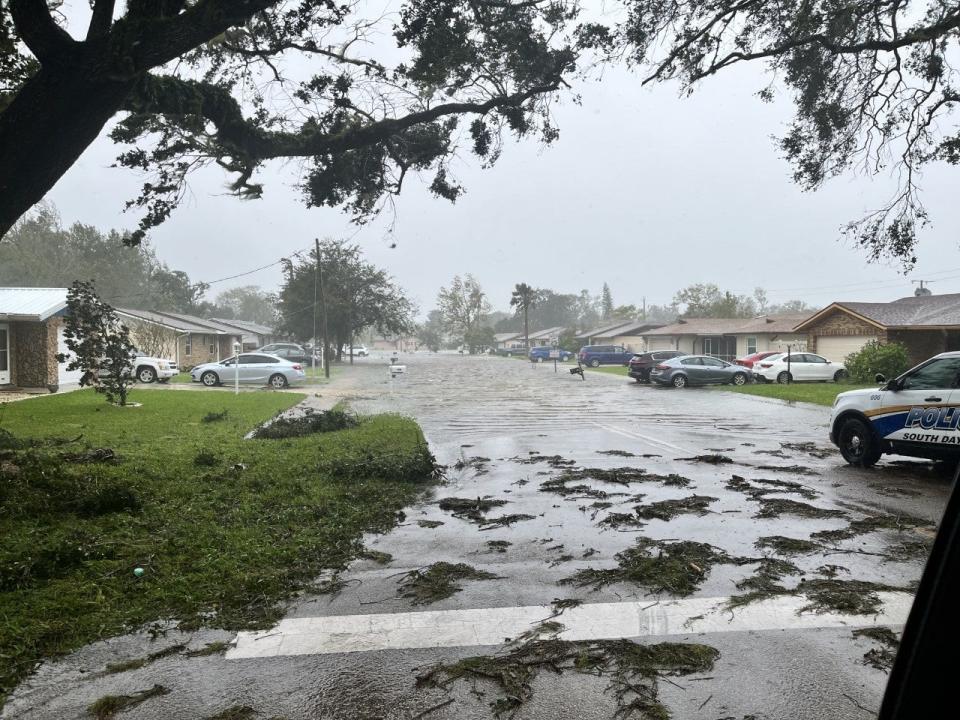 South Daytona police and firefighters rescue people from this flooded neighborhood on Big Tree Road, Thursday, Sept. 29, 2022, during Tropical Storm Ian. Police said all streets are flooded and some homes were also experiencing flooding.