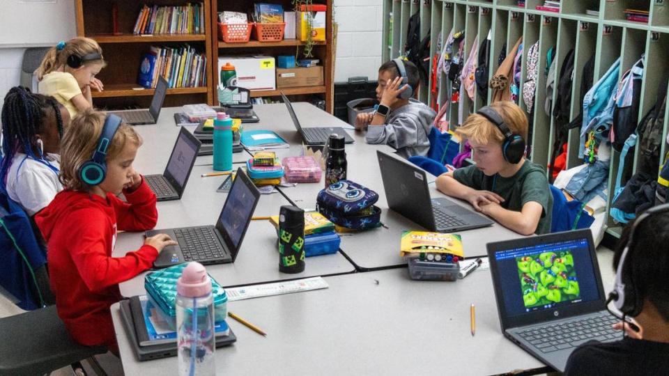 Second grade students of Athens-Chilesburg Elementary school have quiet study sessions on their laptops, on Nov. 1, 2023.