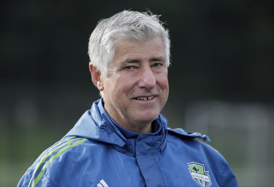 FILE - In this Oct. 27, 2015, file photo, Seattle Sounders coach Sigi Schmid walks off the field following an MLS soccer training session in Tukwila, Wash. Schmid, the winningest coach in MLS history, has died. He was 65. Schmid's family said he died Tuesday, Dec. 25, 2018, at Ronald Reagan UCLA Medical Center in Los Angeles. Schmid was hospitalized three weeks ago as he awaited a heart transplant. (AP Photo/Ted S. Warren, File)
