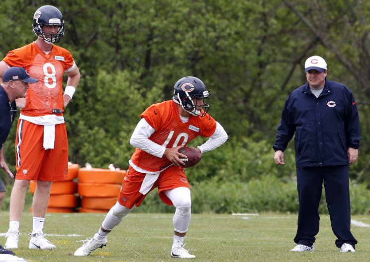 Rookie Mitchell Trubisky (left) is battling Mike Glennon for the Bears' No. 1 QB spot. (AP) 