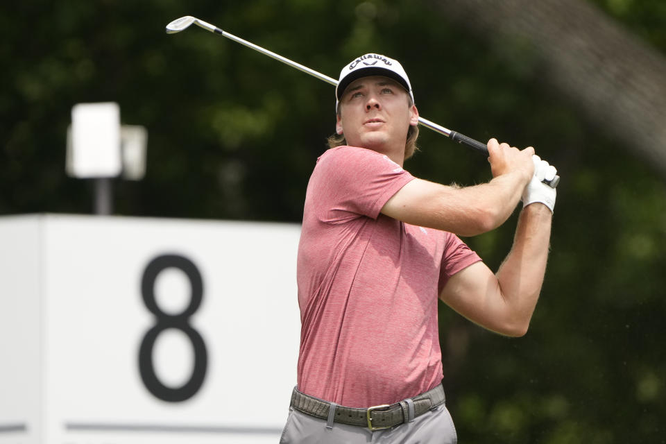 Sam Burns plays his shot from the eighth tee during the second round of the Charles Schwab Challenge golf tournament. Mandatory Credit: Jim Cowsert-USA TODAY Sports