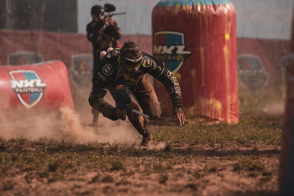 Jonah Jamroz sprints for cover while Cody Mickowski (back) covers him during the Mid-Atlantic Major in Philadelphia earlier this year. Both Jamroz and Mickowski are Wisconsin natives on the Los Angeles Infamous pro paintball team.