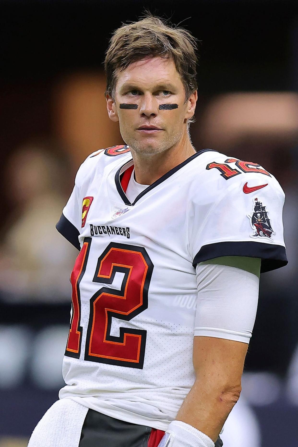 Mandatory Credit: Photo by Jonathan Bachman/AP/Shutterstock (13400496f) Tampa Bay Buccaneers quarterback Tom Brady (12) warms up before an NFL football game against the New Orleans Saints, in New Orleans Buccaneers Saints Football, New Orleans, United States - 18 Sep 2021