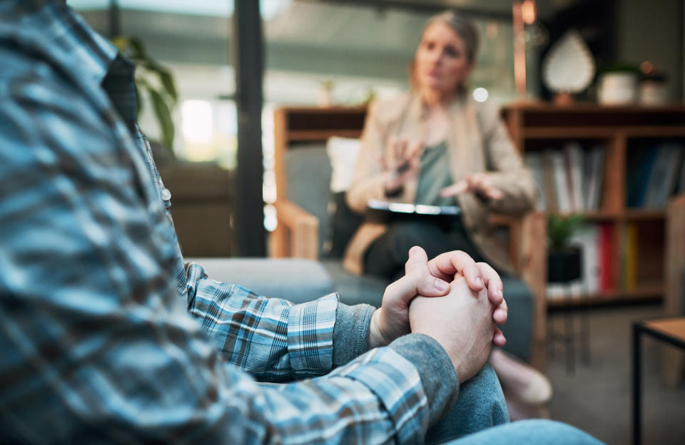 A man sits in therapy