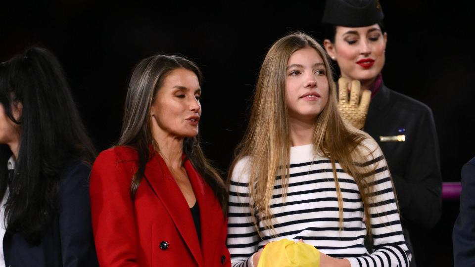 queen letizia in red suit with daughter at women's world cup