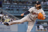 Houston Astros starting pitcher Lance McCullers Jr. watches a delivery to a Los Angeles Dodgers batter during the second inning of a baseball game Tuesday, Aug. 3, 2021, in Los Angeles. (AP Photo/Marcio Jose Sanchez)