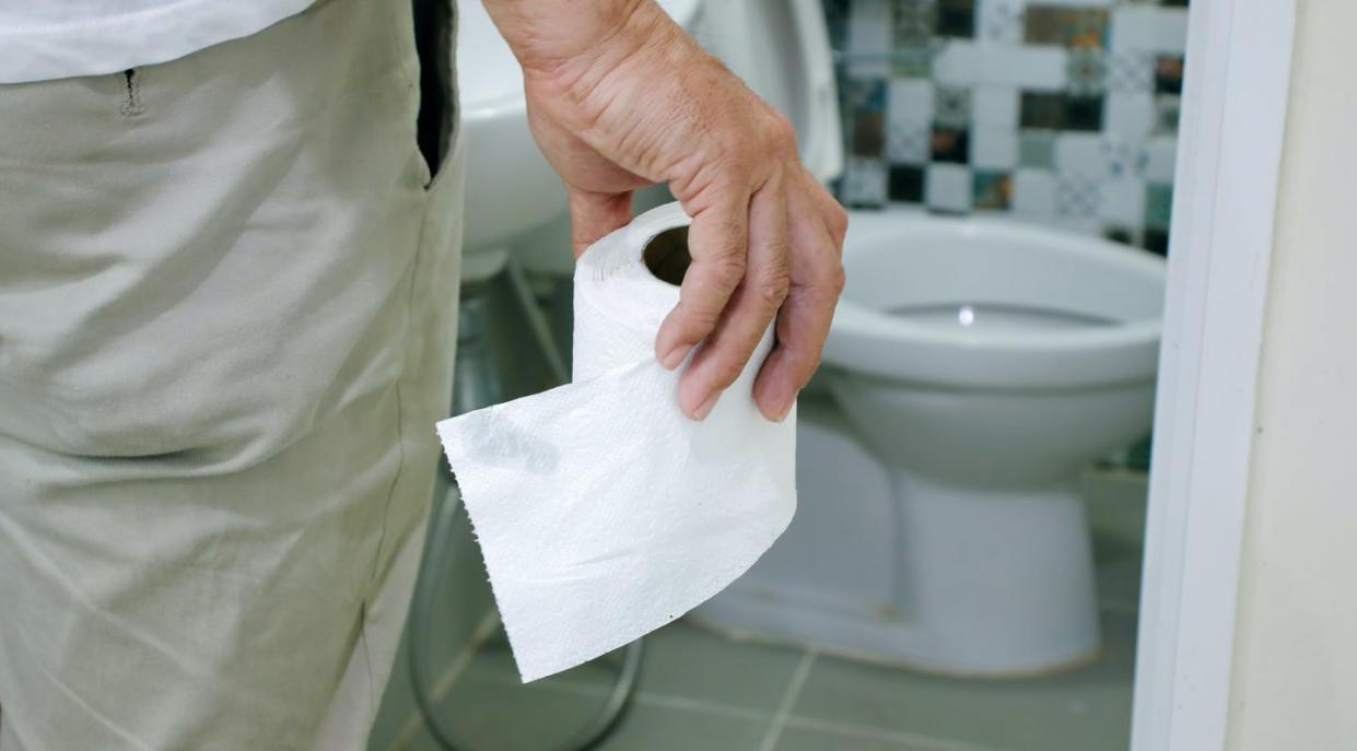 <span class="caption">No matter its cause, diarrhea is uncomfortable.</span> <span class="attribution"><a class="link " href="https://www.gettyimages.com/detail/photo/man-holding-toilet-tissue-roll-in-bathroom-royalty-free-image/1249645235" rel="nofollow noopener" target="_blank" data-ylk="slk:Rapeepong Puttakumwong/Moment via Getty Images;elm:context_link;itc:0;sec:content-canvas">Rapeepong Puttakumwong/Moment via Getty Images</a></span>