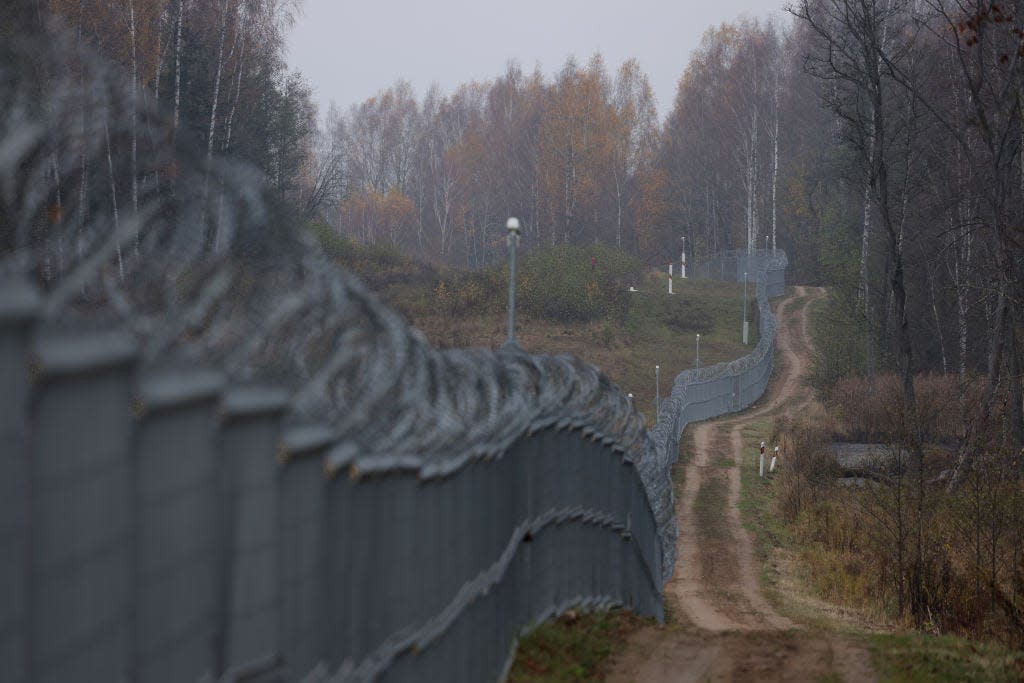 A fence is seen along the border to the Russian semi-exclave of Kaliningrad.