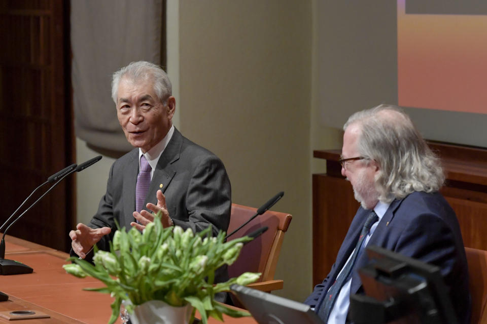 The 2018 Nobel laureates in Physiology or Medicine, Tasuko Honjo, left, and James P. Allison attend a press conference at the Karolinska Institutet, Stockholm, Sweden, Thursday Dec. 6, 2018. (Janerik Henriksson/TT via AP)