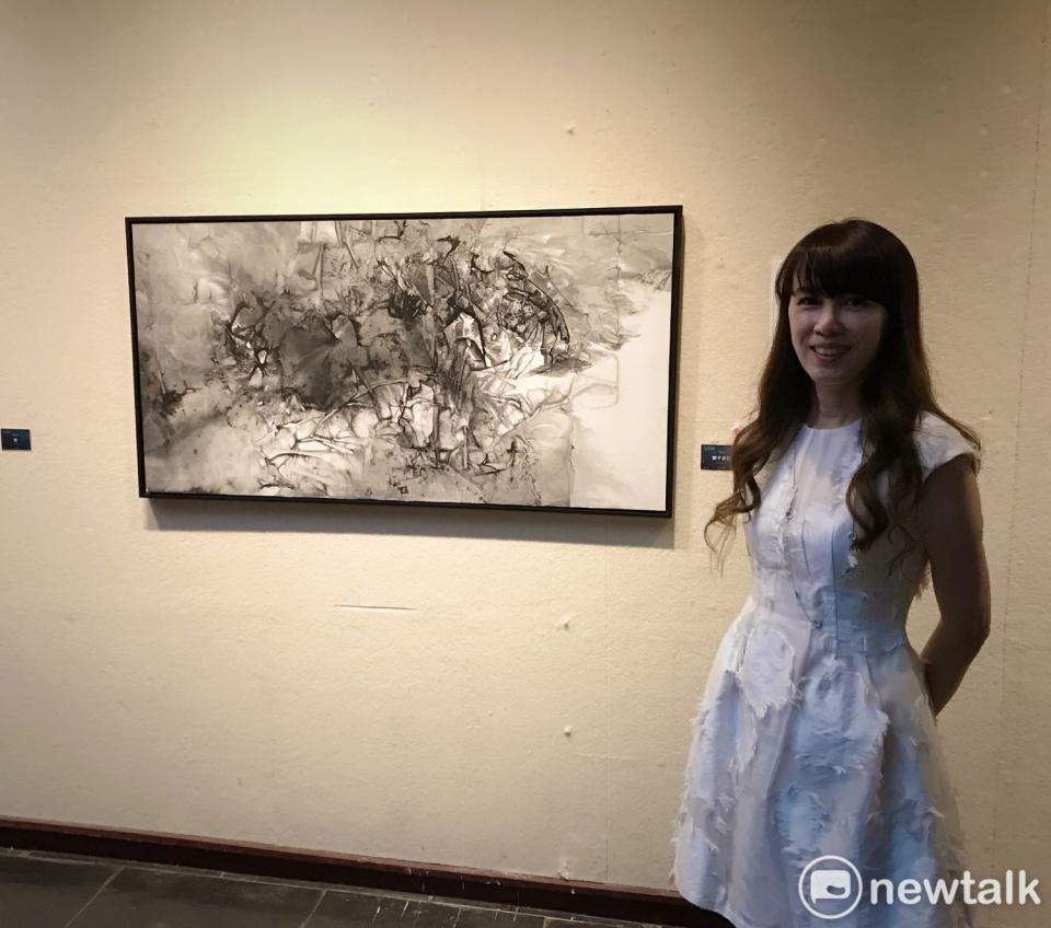 書法家劉心2018年勇奪台南美展書法類第一名，2020年她再勇奪台南美展東方媒材類第一名，成為台南美展囊括兩類首獎的第一人。   圖：黃博郎／攝