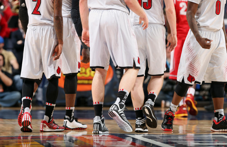 MEMPHIS, TN - MARCH 14: A general view of Adidas sneakers during a game between the Houston Cougars and the Louisville Cardinals during the semifinals of the American Athletic Conference Tournament at FedExForum on March 14, 2014 in Memphis, Tennessee. (Photo by Joe Murphy/Getty Images)