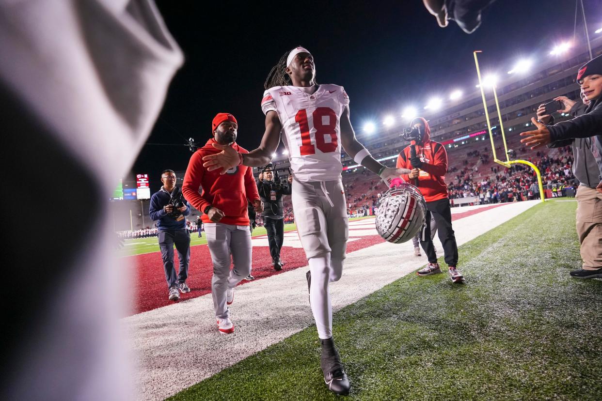 Ohio State wide receiver Marvin Harrison Jr. leaves the field following the Buckeyes' 24-10 win at Wisconsin.