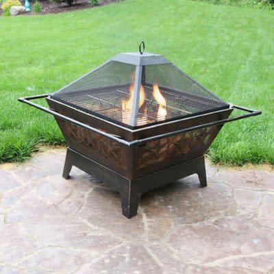 9) Sunnydaze Northern Galaxy Wood Fire Pit with Cooking Grate in Bronze