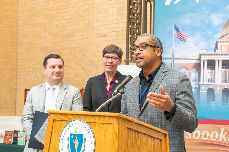 Author Jerald Walker of Hingham collected his Massachusetts Book Award at the State House in January. Sen. Patrick O'Connor and Rep. Joan Meschino listen in the background.