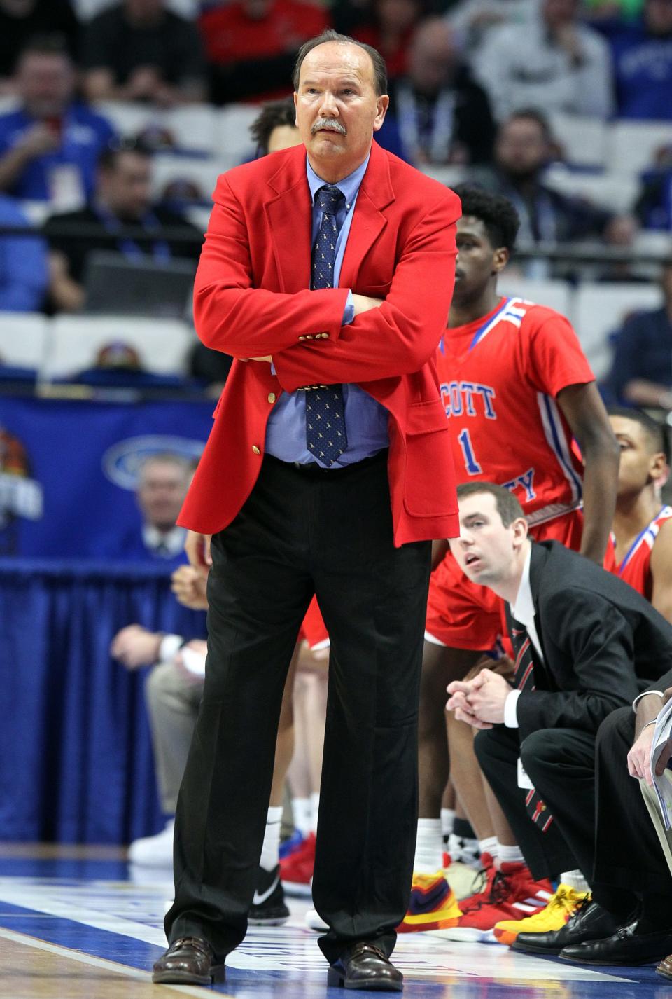 Scott County head coach Billy Hicks watches his team during the championship game of the KHSAA Sweet 16 against Trinity in Lexington, Sunday, March 10, 2019. Trinity won 50-40.