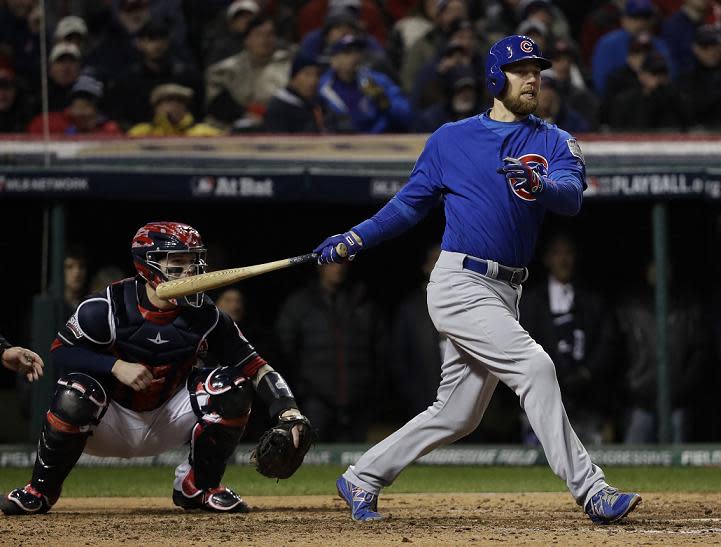 Ben Zobrist follows through on his RBI triple during the fifth inning of World Series Game 2. (AP)